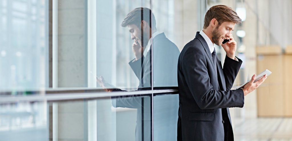 Image of office worker using Columbus UK business mobile services and devices.