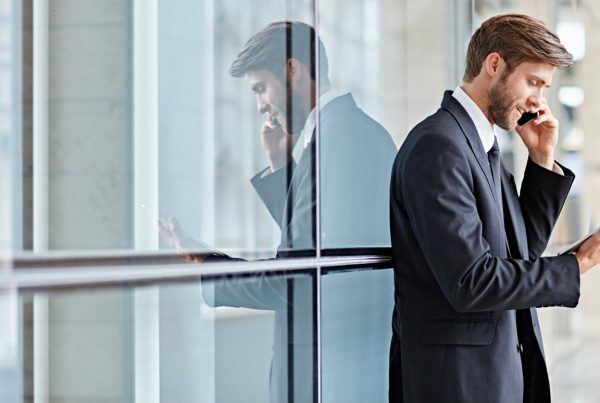 Image of office worker using Columbus UK business mobile services and devices.